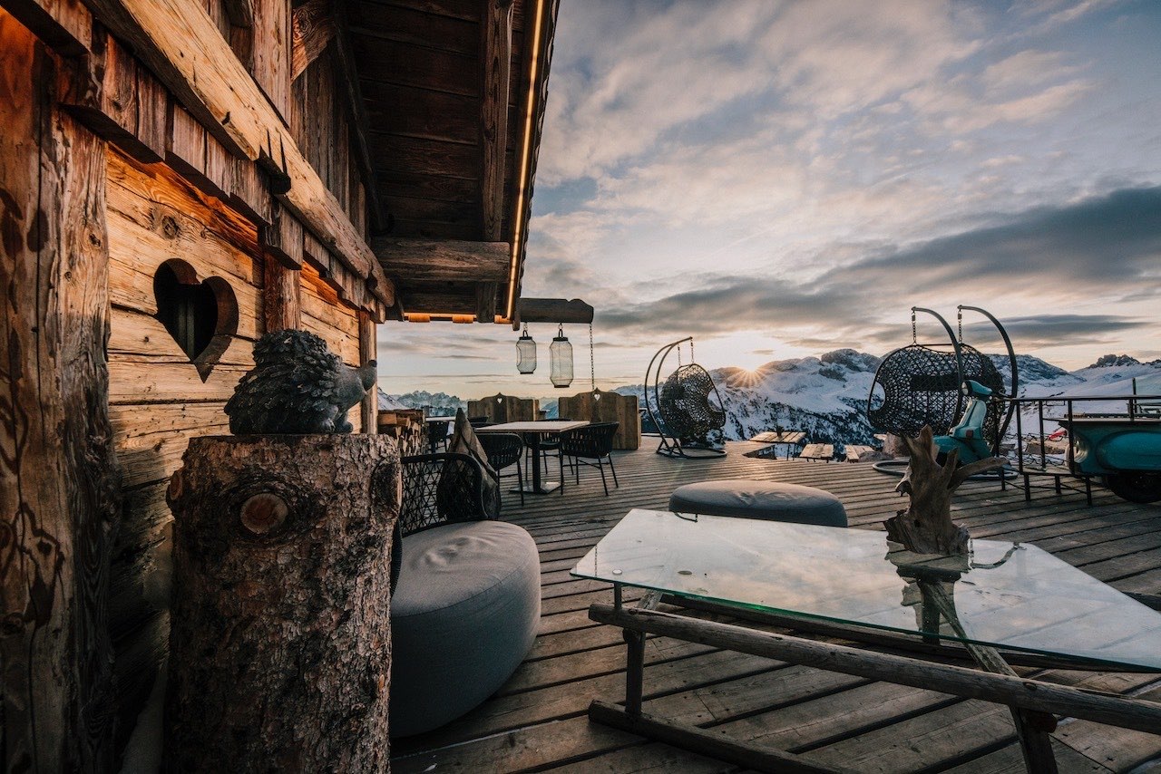Sunset on the terrace of a mountain rifugio