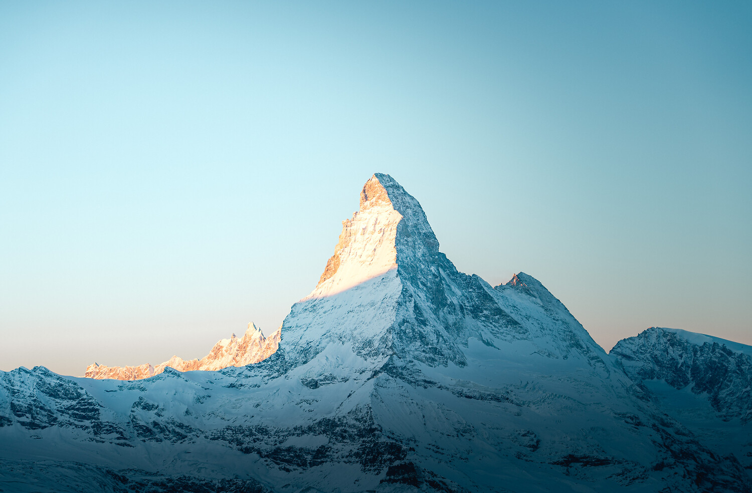 The Matterhorn lit orange at sunrise